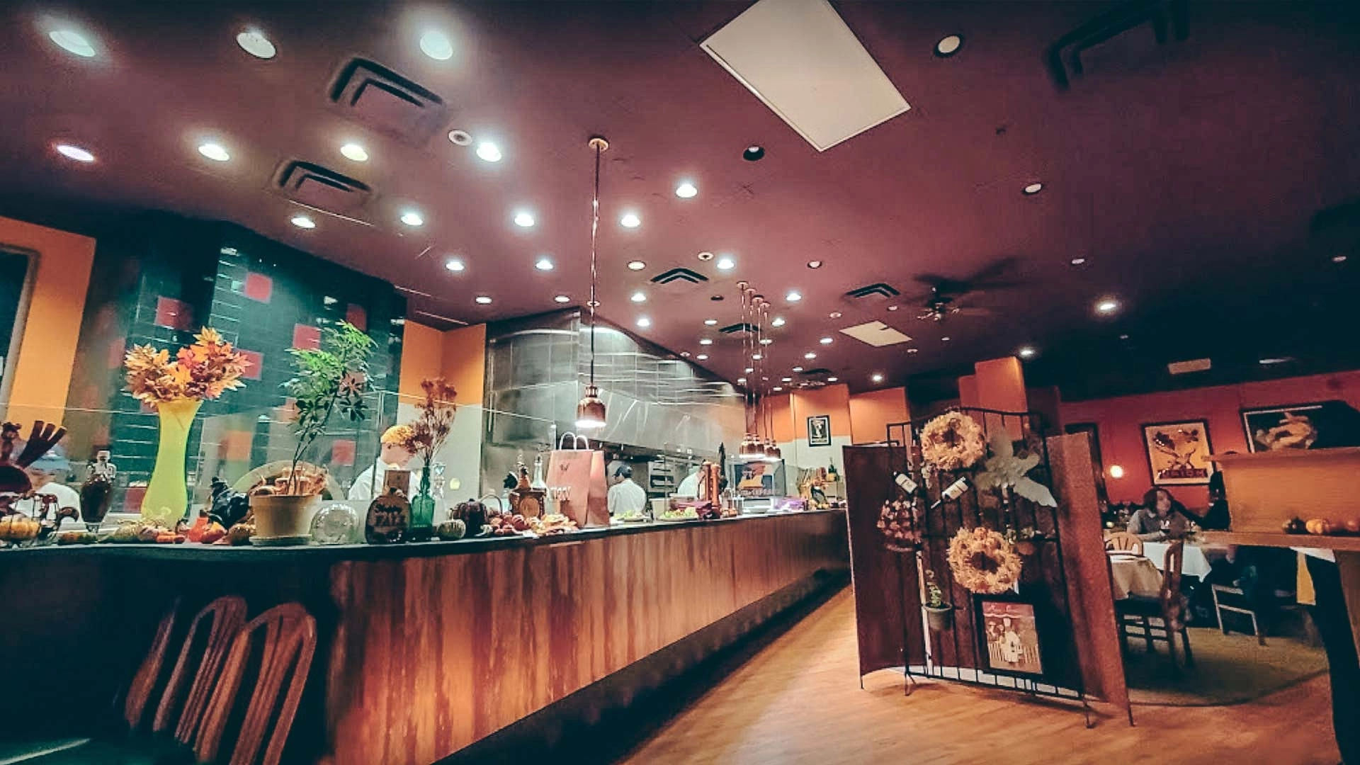 Southside Bistro lively dining room and open kitchen hardwood fire